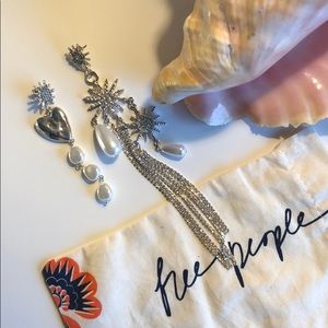 Free people asymmetric earrings. 🦄